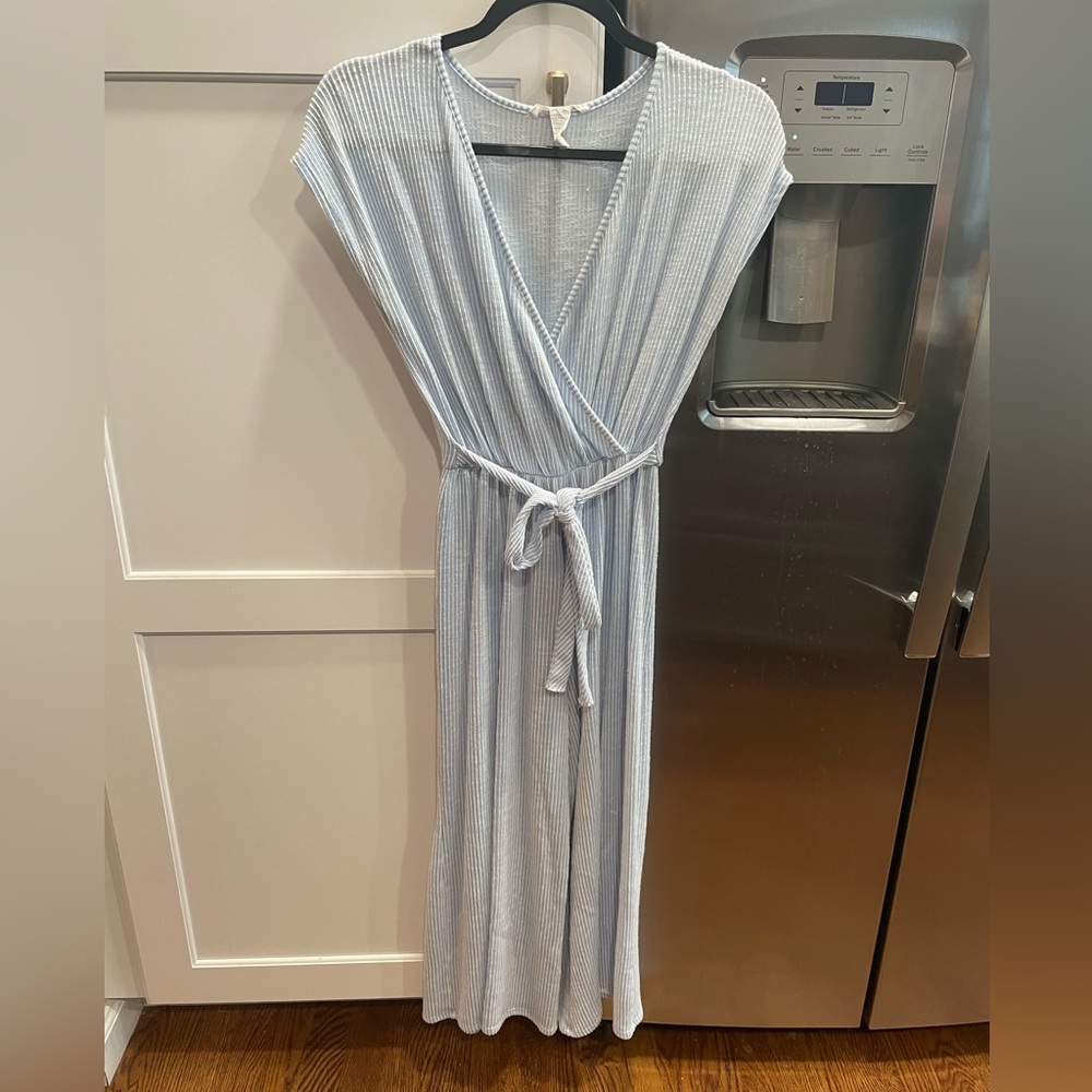 Adorable romper for spring! Pale blue and white stripe with elastic waist.